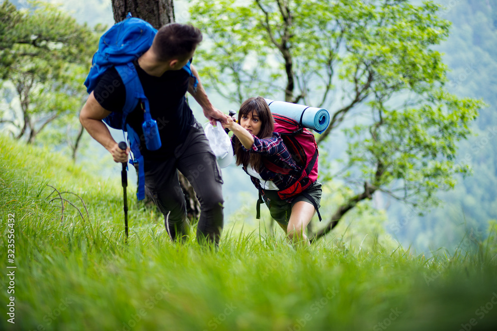 Active couple hiking in a forest