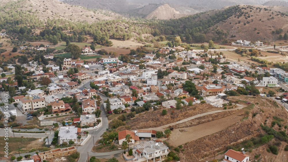 Aerial panorama of old village Cyprus mountains, drone photo.