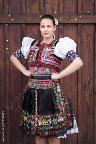 Young beautiful slovak woman in traditional costume