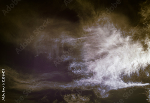 Dark sky with clouds, background for design, decoration or wallpaper.
