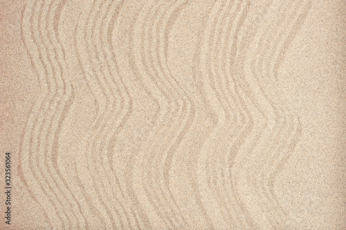Beach sand with waves, with smooth sand area.top view
