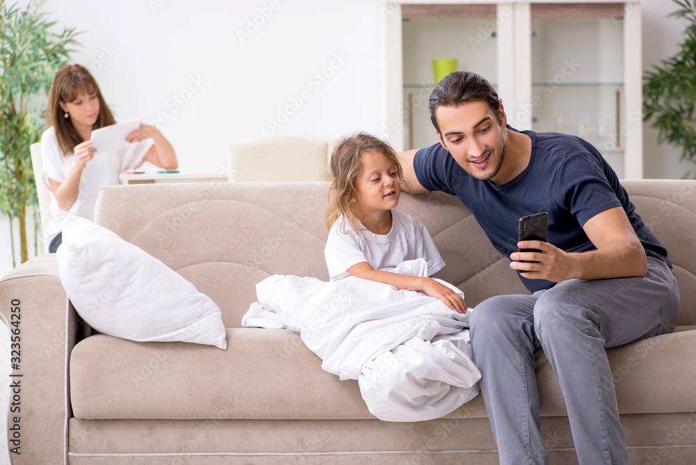 Father taking care of his ill daughter Father taking care of his ill daughter