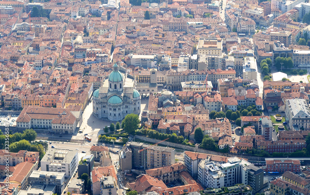 Aerial view on the city of Como with cathedral in prominent position, in Ticino, Italy