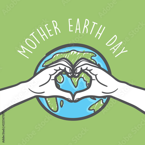 Love hand sign and earth between the hands celebrating Mother earth day.