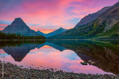 Sinopah Mountain and its reflection in Two Medicine Lake.Glacier National Park.Montana.USA photo