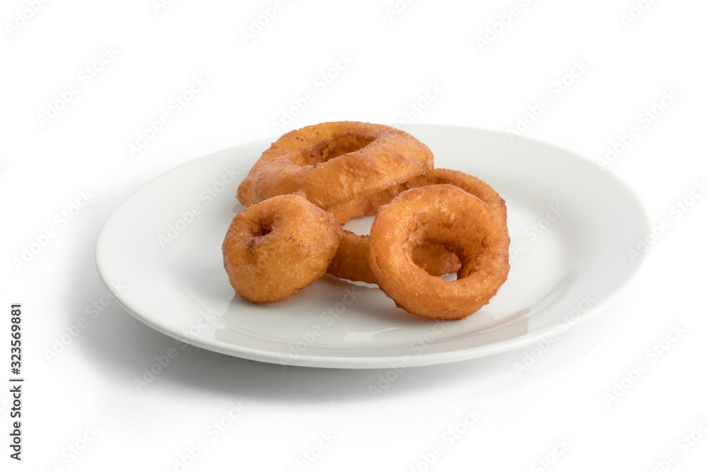 jumbo onion rings on aplate isolated on white jumbo onion rings on aplate isolated on white