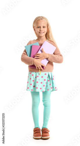 Little girl with books on w...