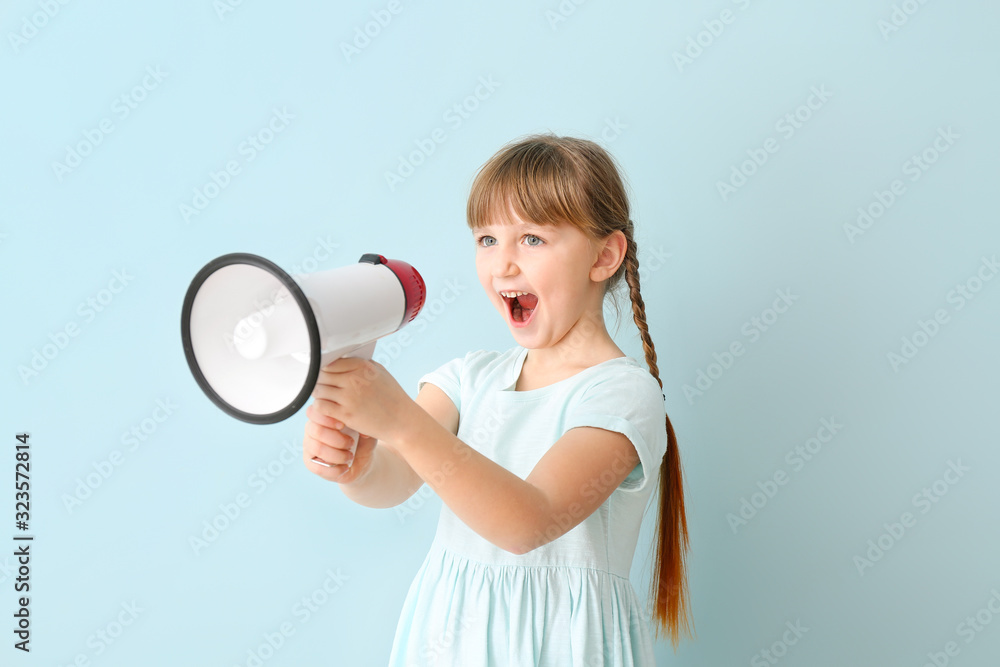 Cute little girl with megaphone on color background Cute little girl with megaphone on color background