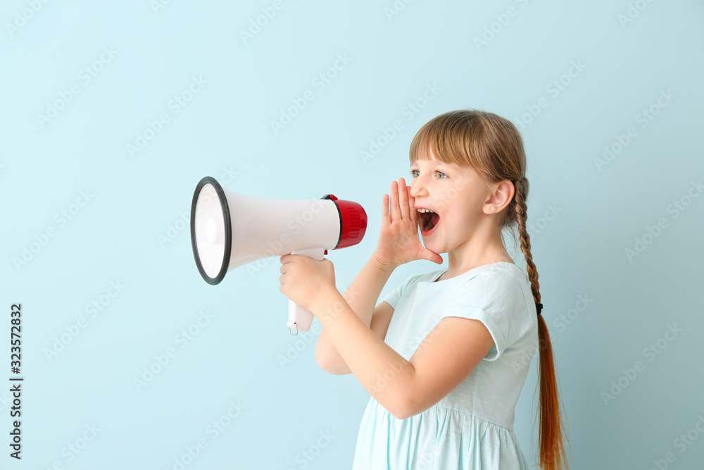 Cute little girl with megaphone on color background Cute little girl with megaphone on color background