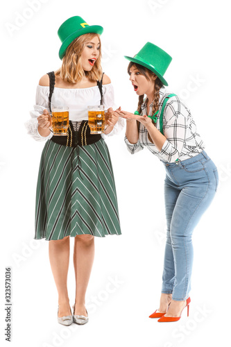 Funny young women with beer...