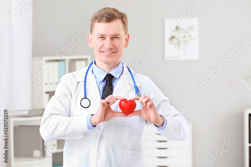 Male cardiologist in modern...