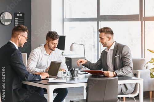Wallpaper Mural Businessmen during meeting in office Torontodigital.ca
