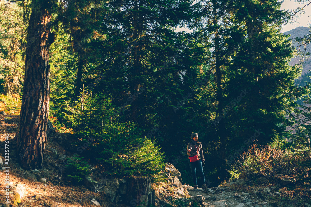 Woman hike through mountain and beautiful nature of forest. Woman hike through mountain and beautiful nature of forest.