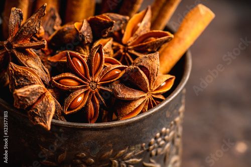 Dried anise stars on the rustic background. Selective focus. Shallow depth of field.