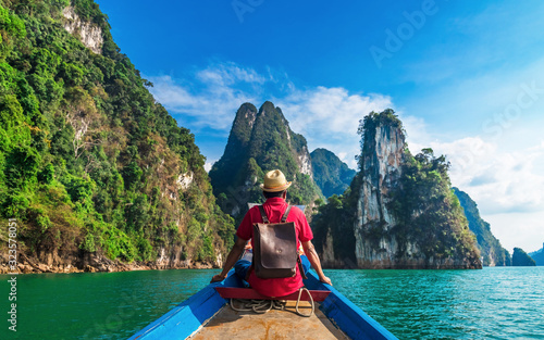 Man traveler on boat joy view nature rock mountain island scenic landscape Khao Sok National park, Famous travel adventure place Thailand, Tourism beautiful destinations Asia holiday vacation trip