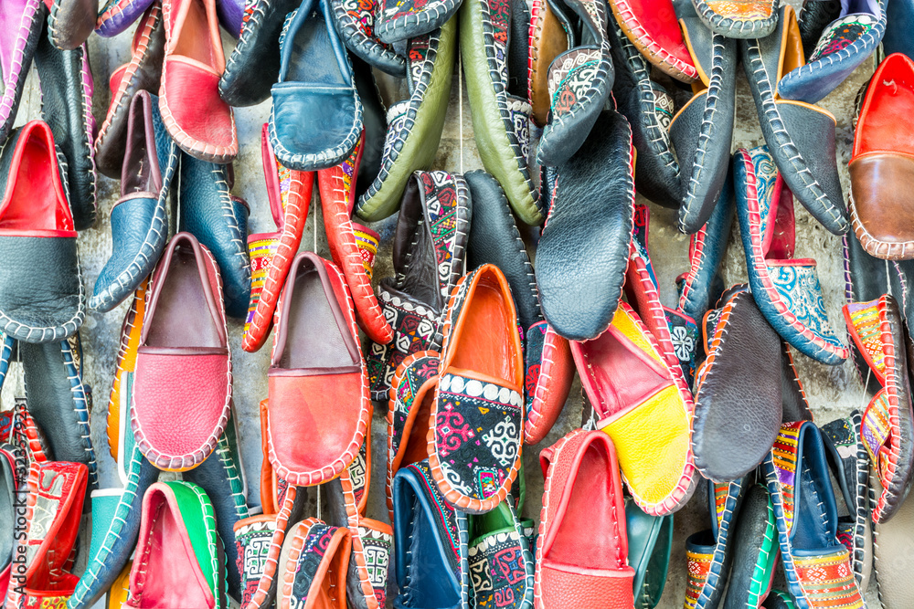 Colorful shoes for sale at the Arasta Bazaar where there many shops for sweets , gold, Crafts can buy as gifts.  near to Blue Mosque and Restaurants in the Europe side of Istanbul, Turkey.