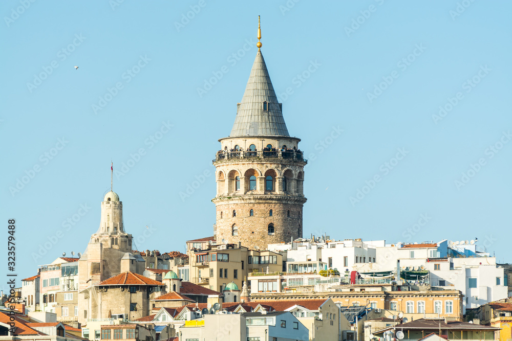 The Galata Tower, called Christea Turris, a medieval stone tower and buildings in the Karakoy quarter of Istanbul, Turkey, to the north of the Golden Horn's junction with the Bosphorus.
