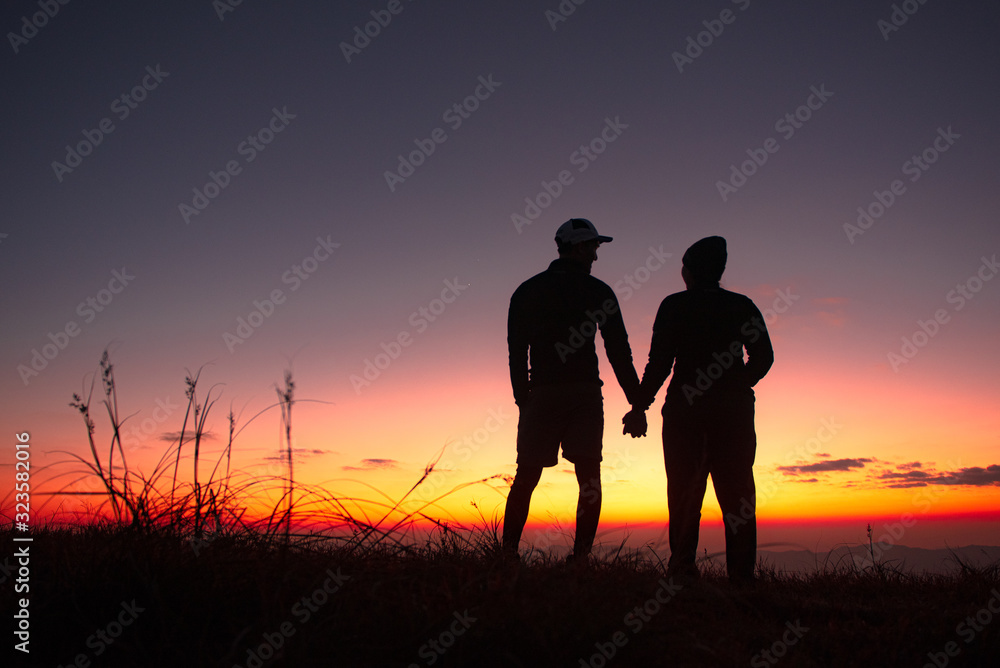 23.10.2019 Friend Group hiking Doi Monjong, Chiang Mai, Thailand., Sunset Silhouette of Young Lovers Hugging in the Mountains., Photos with high shadows and selectable focus