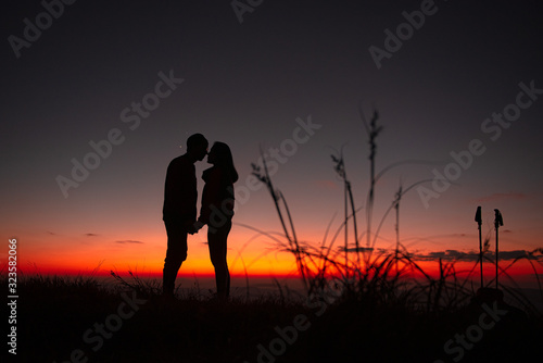 23.10.2019 Friend Group hiking Doi Monjong, Chiang Mai, Thailand., Sunset Silhouette of Young Lovers Hugging in the Mountains., Photos with high shadows and selectable focus