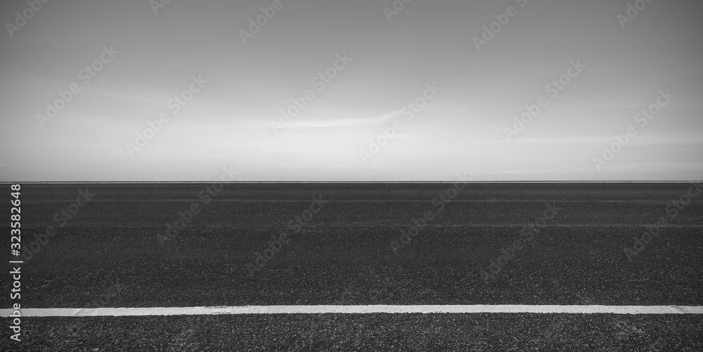 Side view of asphalt road with dark sky background Stock Photo | Adobe