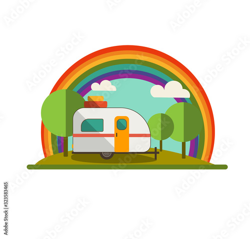 Camper Trailer in Nature with Rainbow
