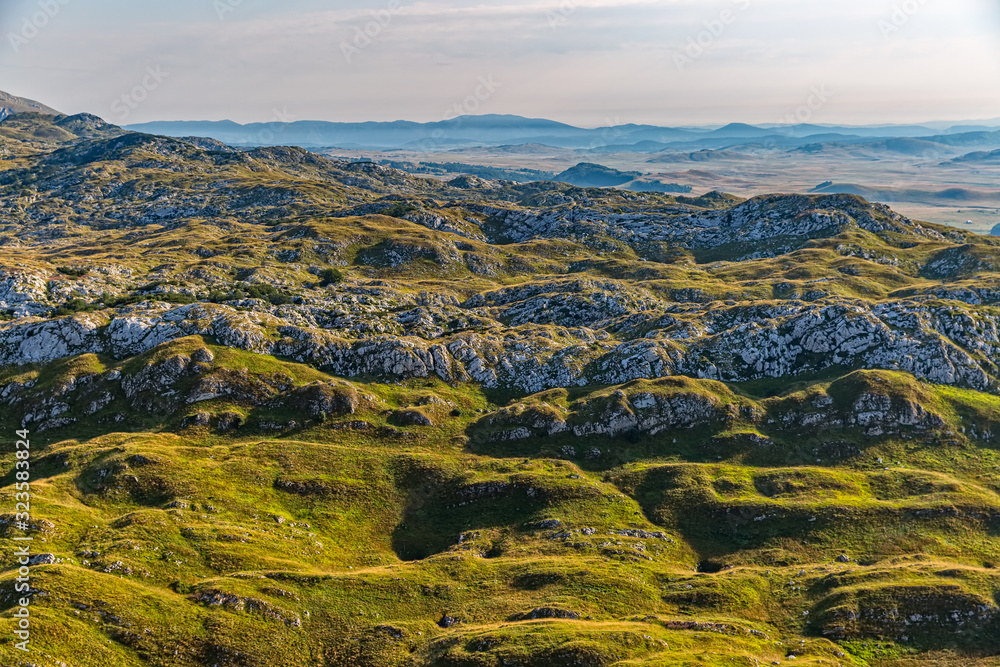 Naklejka premium Montenegro mountains at sunrise - aerial