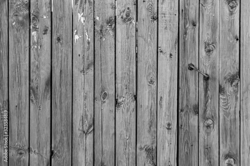 Old outdoor gray wooden wall background photo texture