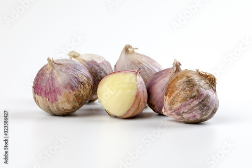 Small solo single clove garlic monobulb garlic single bulb garlic pearl garlic photo