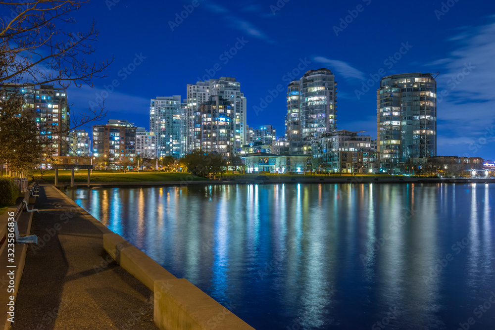 Obraz premium House building and city concept: evening outdoor urban view of modern real estate homes.