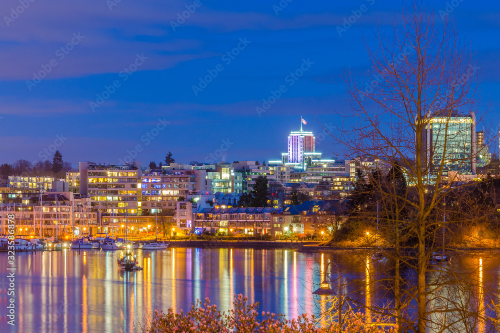 House building and city concept: evening outdoor urban view of modern real estate homes. House building and city concept: evening outdoor urban view of modern real estate homes.