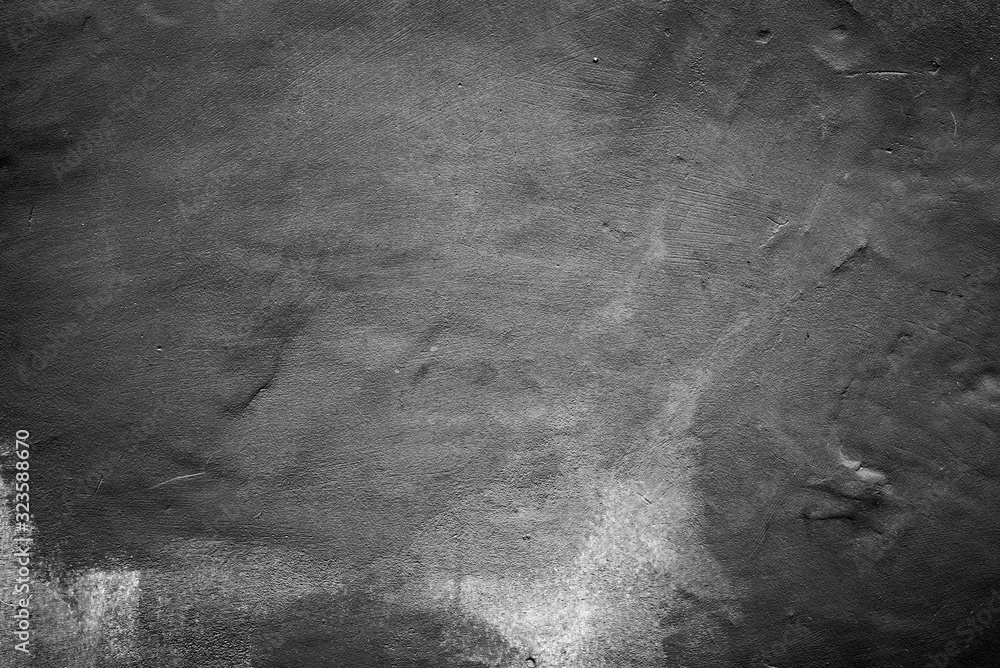 Naklejka Texture of a concrete wall with cracks and scratches which can be used as a background