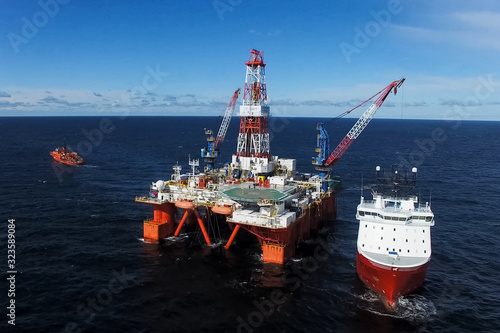 Oil offshore platform in the sea. Extraction of oil on the shelf
