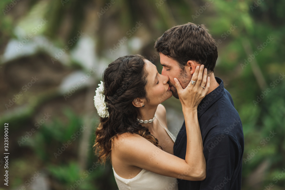 Young latin american couple with amazing view of Ubud rice terraces in morning. Happy together, honeymoon in Bali. Travel lifestyle. Young latin american couple with amazing view of Ubud rice terraces in morning. Happy together, honeymoon in Bali. Travel lifestyle.