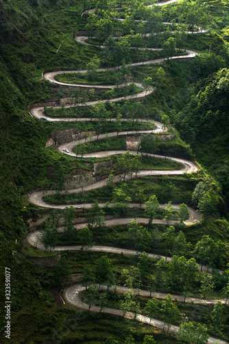Wallpaper Mural Winding road from the high mountain pass in Guizhou, China. Great road trip. Torontodigital.ca