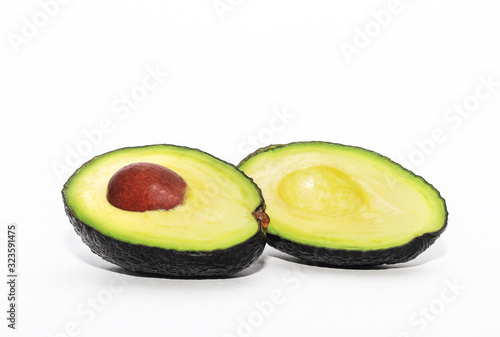 Avocado Hass divided into two halves.