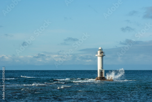 灯台と白波 北海道日本海