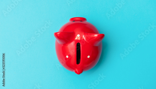 Red piggy bank. Business concept, top view