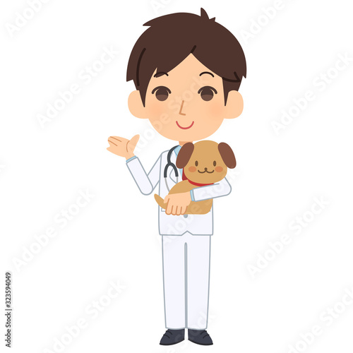 説明をする獣医と犬