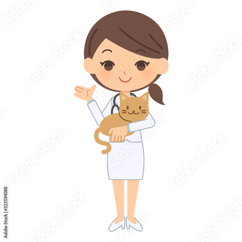 説明をする獣医と猫