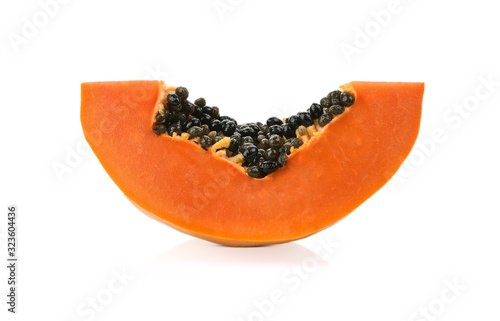 Fresh ripe juicy papaya slice on white background