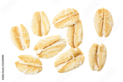 oat flakes isolated on white background. Top view photo