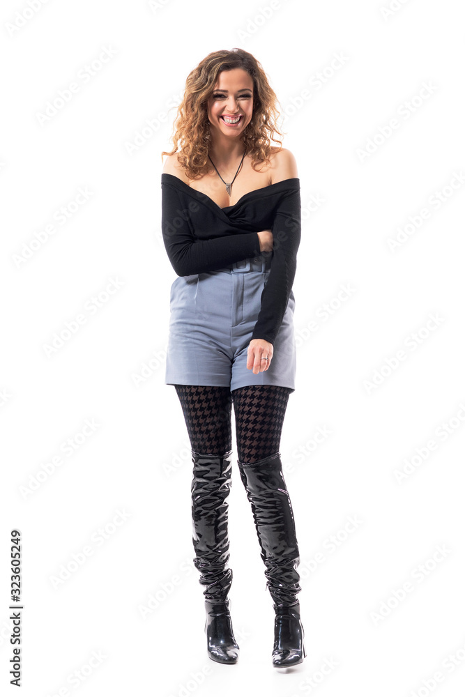 Laughing cute young pretty woman after hearing joke spontaneously. Full body isolated on white background. Laughing cute young pretty woman after hearing joke spontaneously. Full body isolated on white background.