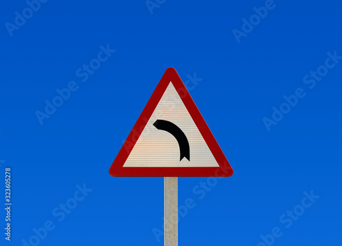 Road Warning Sign, road ahead curves to the left side