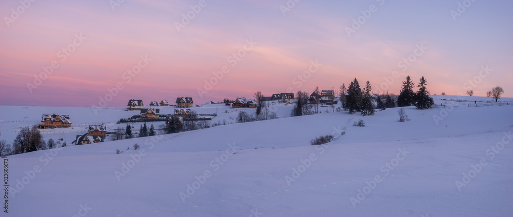 village in the mountains during the winter morning-panorama