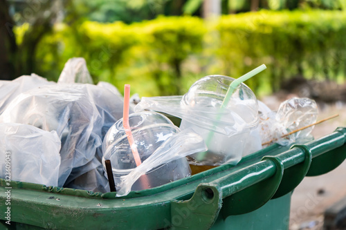 Obraz na płótnie Single-use plastic cups in garbage bin