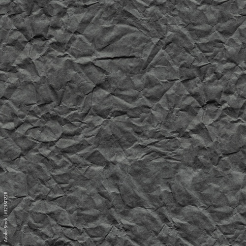 Crumpled paper background in stylish metalic grey color for unique holiday gift. Seamless texture.