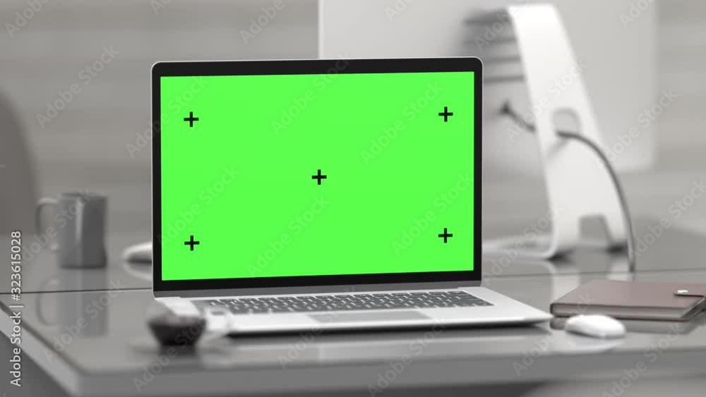 Laptop selective focus on table Work desk. Computer mock-up with green screen for your text with Notebook ,Mouse ,Alarm clock ,Paper Clip ,Pencil and Pin. 3d render. Laptop selective focus on table Work desk. Computer mock-up with green screen for your text with Notebook ,Mouse ,Alarm clock ,Paper Clip ,Pencil and Pin. 3d render.