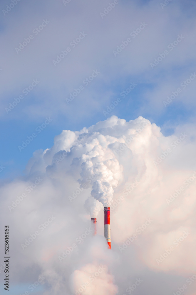 Smoke over the industrial complex. Environmentally friendly production.
