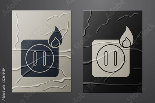 White Electric wiring of socket in fire icon isolated on crumpled paper background. Electrical safety concept. Plug outlet on fire. Paper art style. Vector Illustration