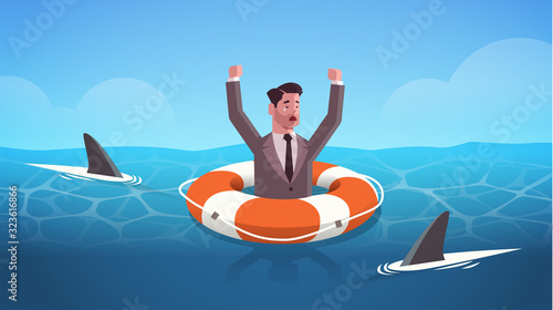 businessman raising hands inside lifebuoy in water full of shark helping business to survive help support financial crisis frustration concept horizontal portrait vector illustration